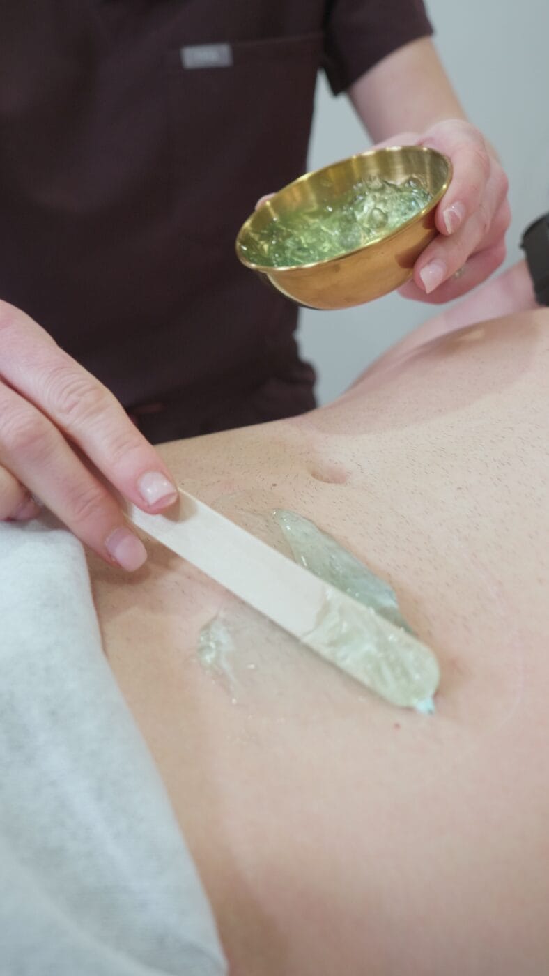Body contouring treatment gel application at Dawn Clinic