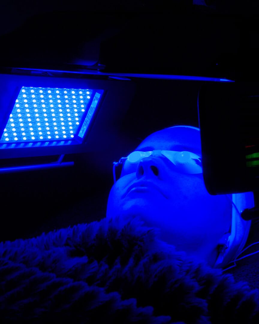Dermalux blue LED light panel treatment at Dawn Clinic